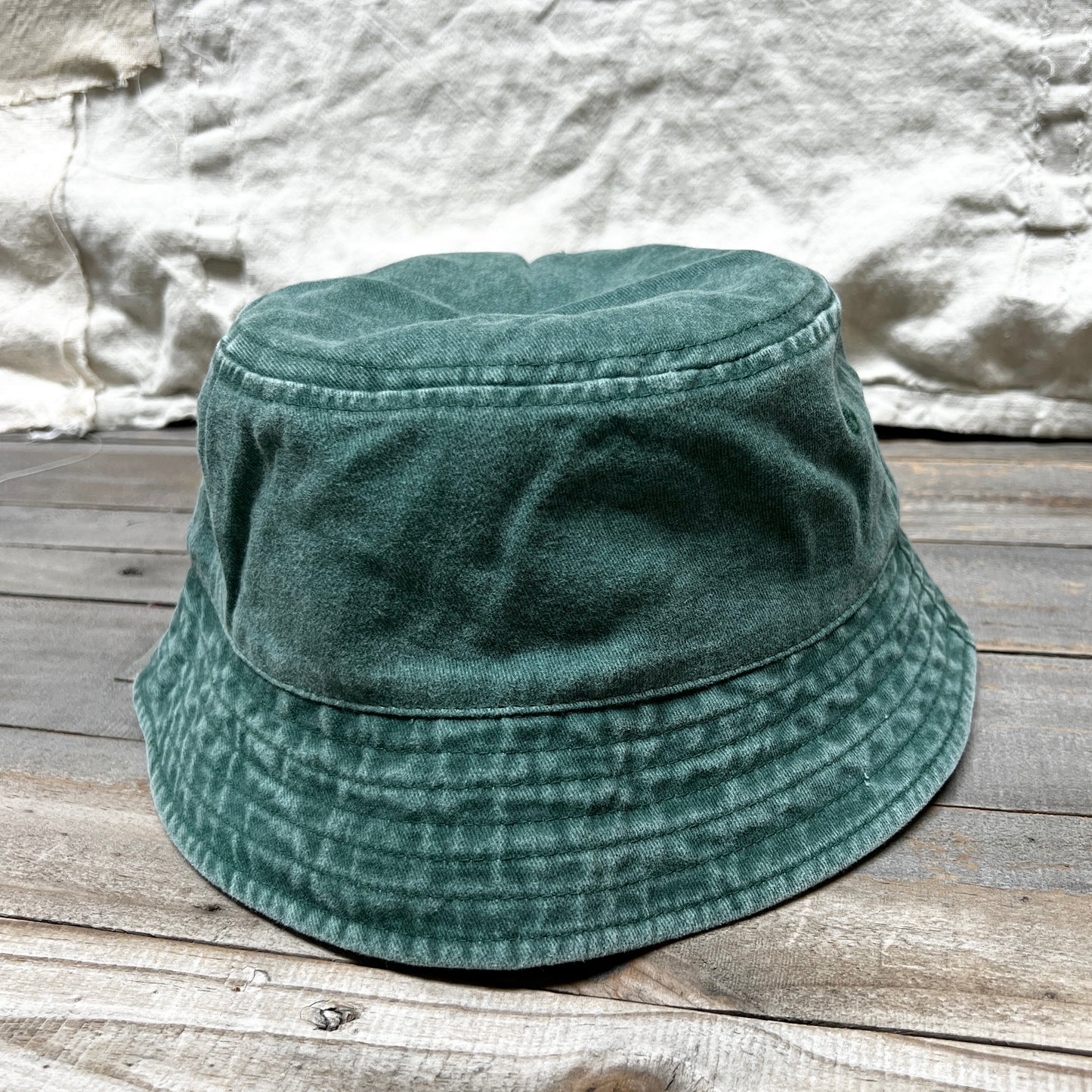 WASHED COTTON BUCKET HAT WITH CUSTOM HAND EMBROIDERY- FADED PINE